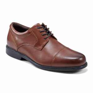 Brown leather cap-toe Oxford shoe with black laces and sole.