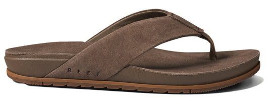 Brown leather flip-flop with a thick sole.