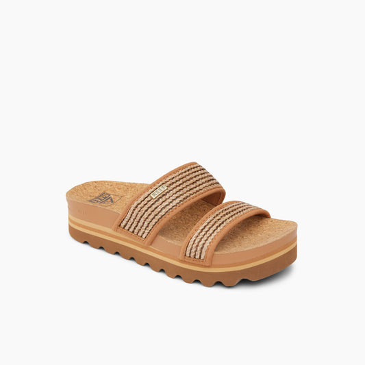 Two strap platform sandal with tan cork footbed and tan sole.