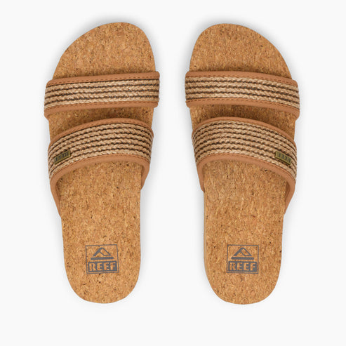 Pair of cork sandals with two striped fabric straps.