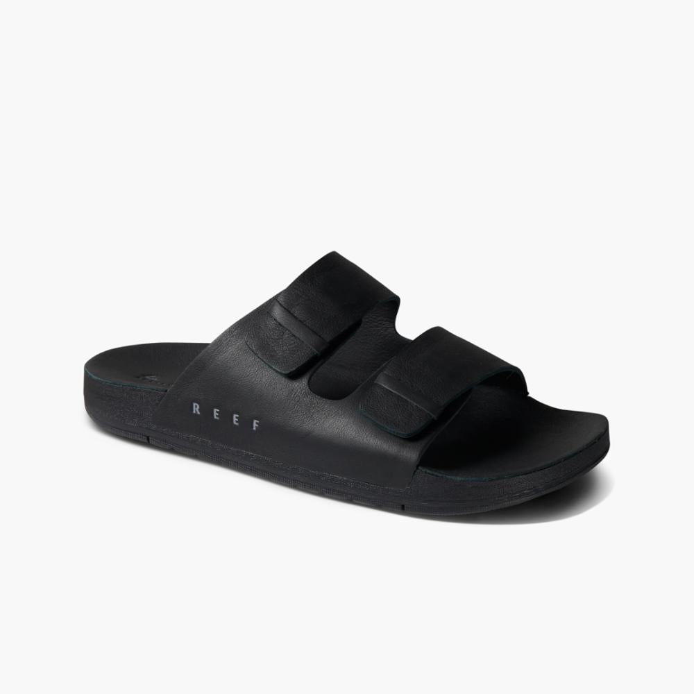 Black sandal with two straps and REEF text on the footbed
