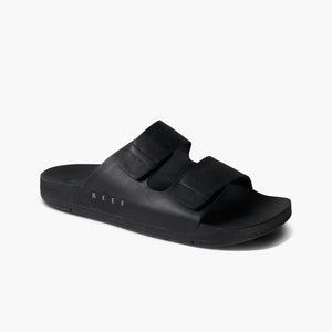 Black sandal with two straps and REEF text on the footbed