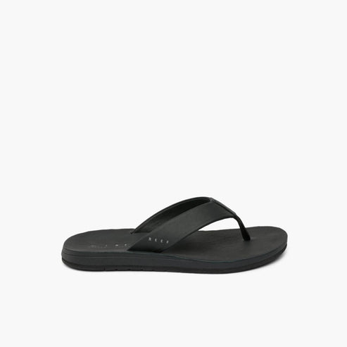 Black flip-flop with black strap.