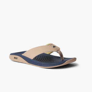 Tan and navy blue flip-flop with textured sole.
