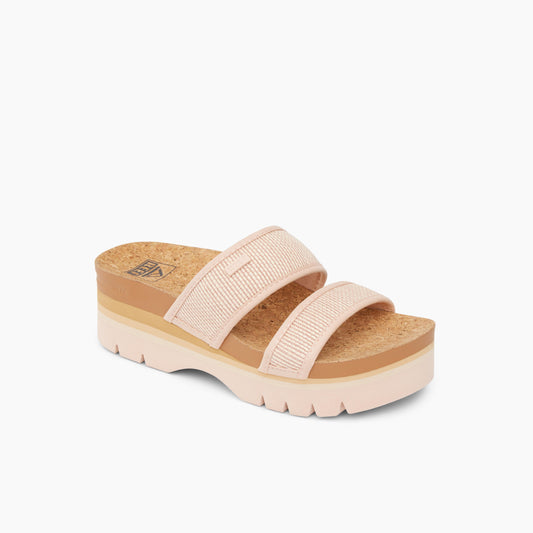 Platform sandal with two pink fabric straps.