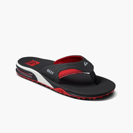Black flip-flop with red and white accents.