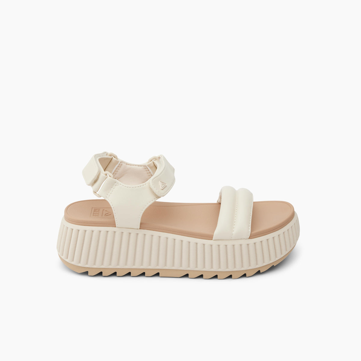 White platform sandal with padded straps.