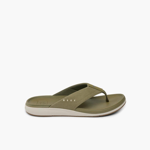 Olive flip-flop sandal with the word "REEF" on the foot strap.