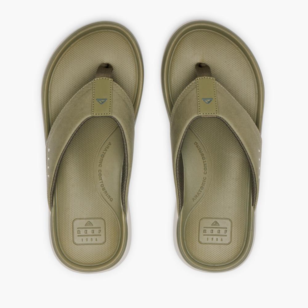 Pair of olive green flip flops.