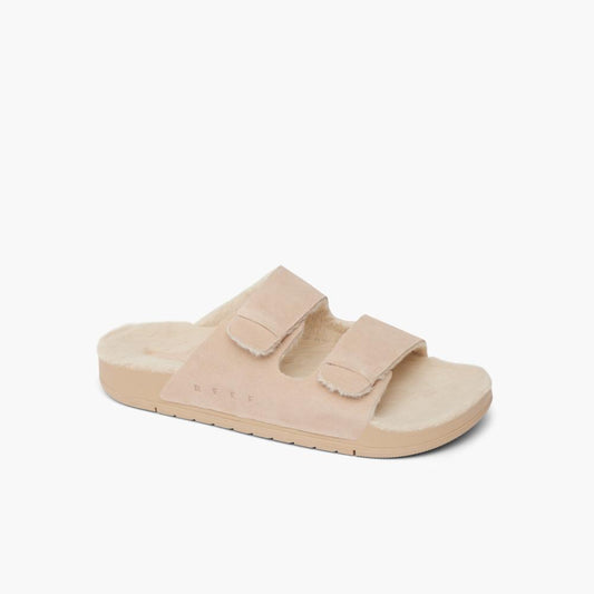 Beige slide sandal with two adjustable hook and loop straps.