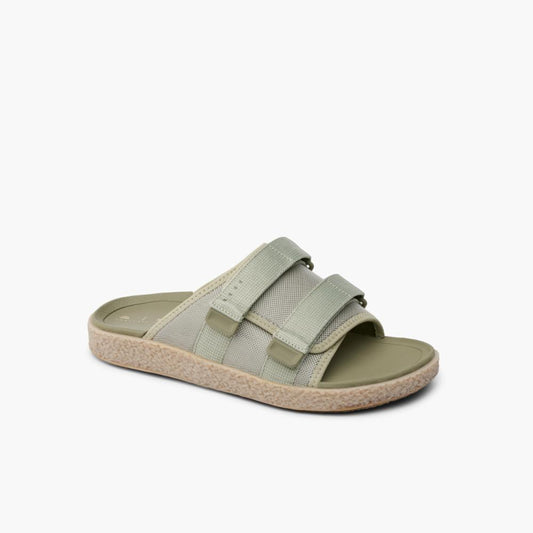 Slide sandal with three adjustable hook-and-loop straps and treaded sole.