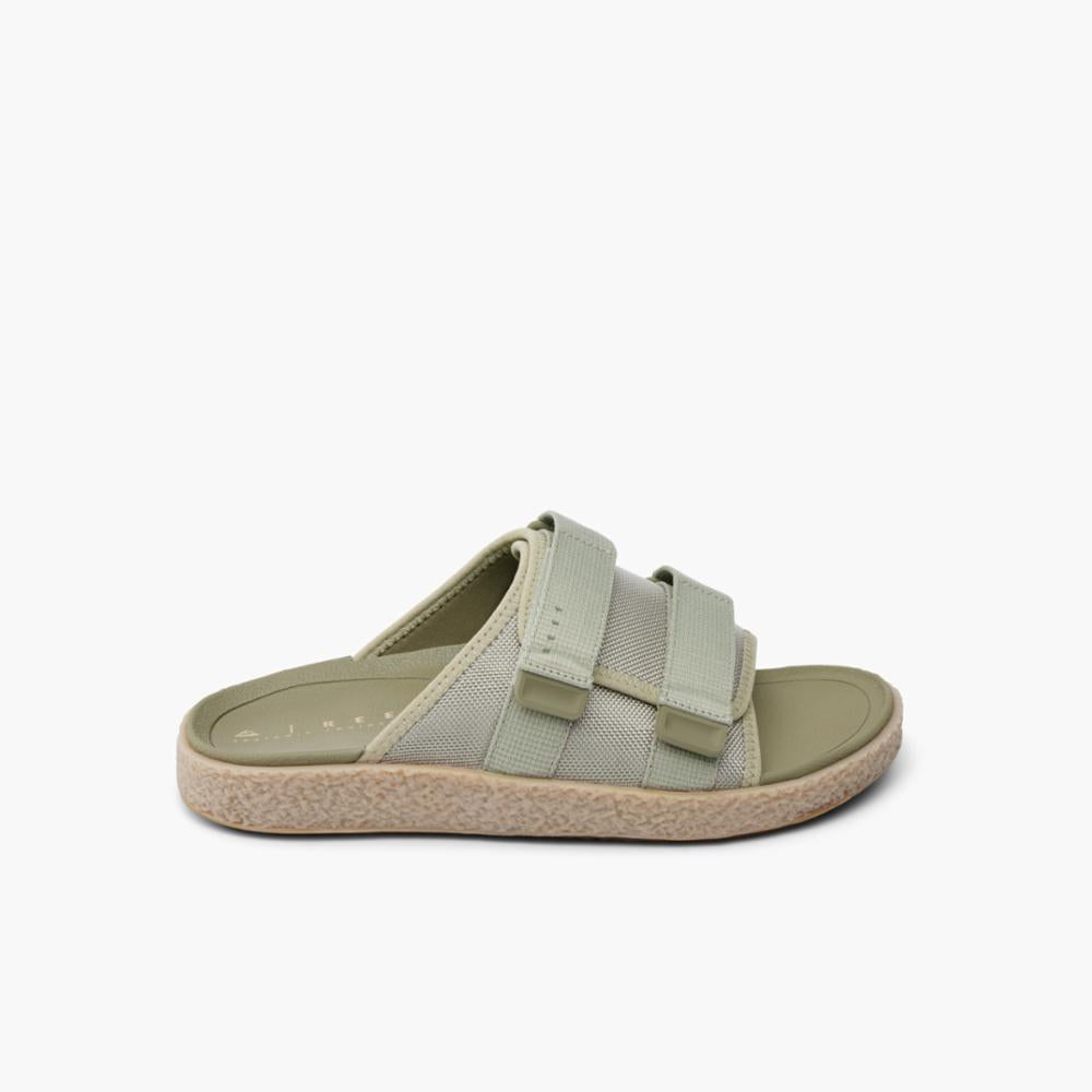 Olive slide sandal with two hook and loop straps and textured sole.