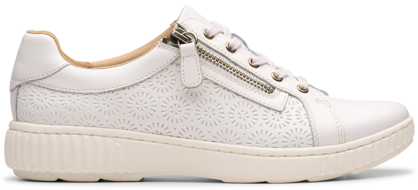 White leather sneaker with perforated pattern and side zipper.