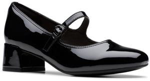 A black patent leather Mary Jane pump with a round toe and a block heel, featuring a single adjustable strap with a buckle across the instep.