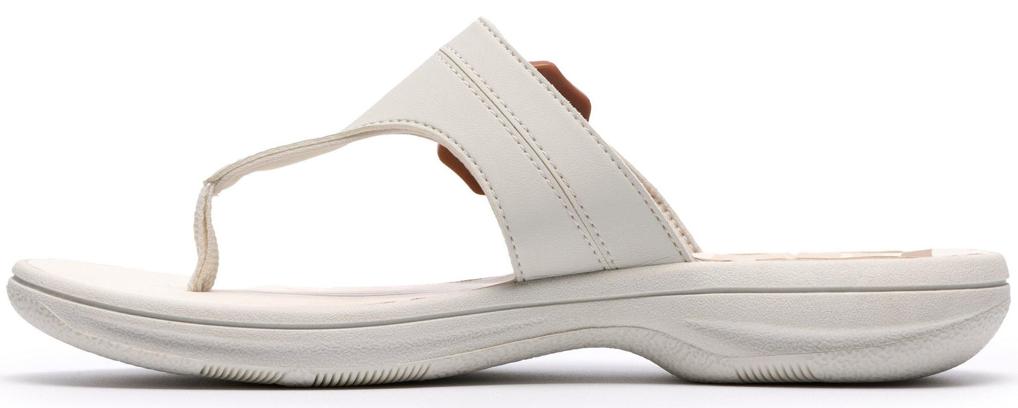 White sandal with toe post.