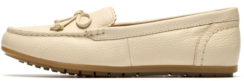 A cream-colored leather moccasin with a brown sole.