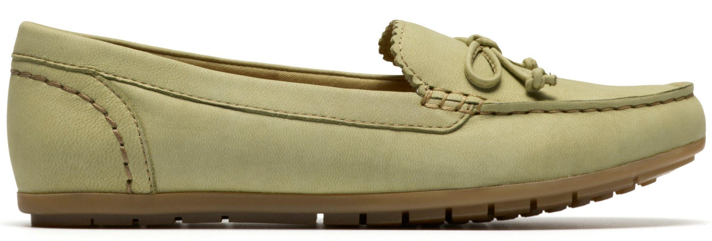 A light green moccasin with a brown sole.