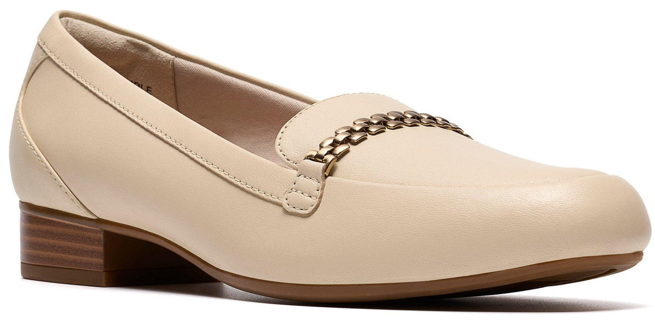 Beige dress shoe with a chain strap.