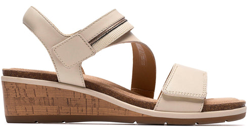 Wedge sandal with adjustable straps and cork midsole.