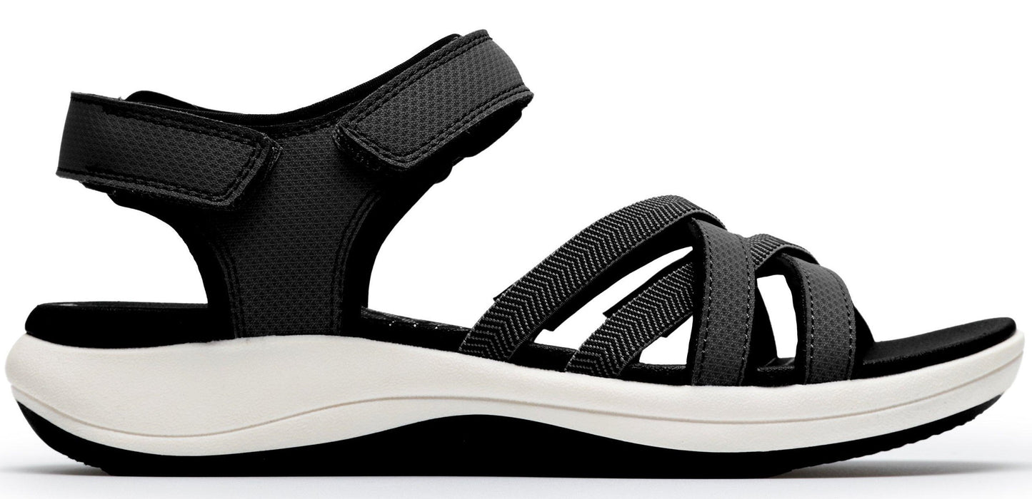 A black sandal with multiple straps and a hook and loop fastener.