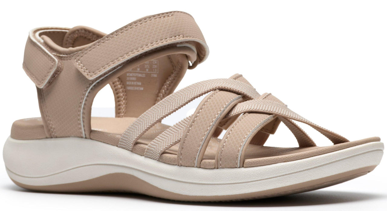 Tan sandal with multi-strap design and velcro ankle strap.