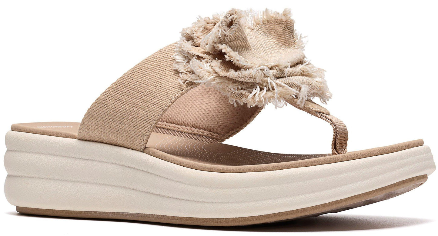 Beige wedge sandal with toe post and tan fabric flower.