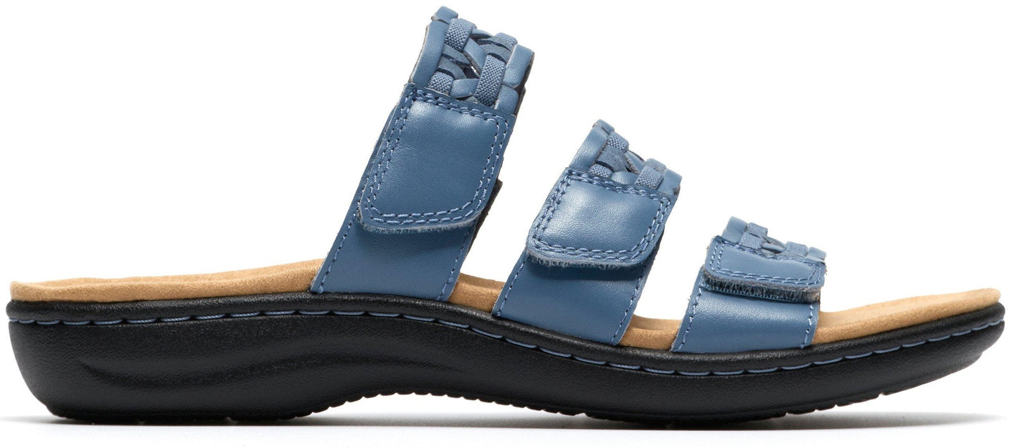 Blue sandal with three woven straps.