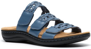 Blue sandal with a woven strap design and adjustable velcro closures.