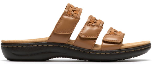 A tan sandal with three woven straps.
