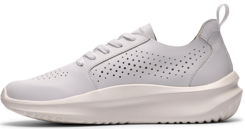 Low top white leather sneaker with a thick sculpted sole and perforated accents.