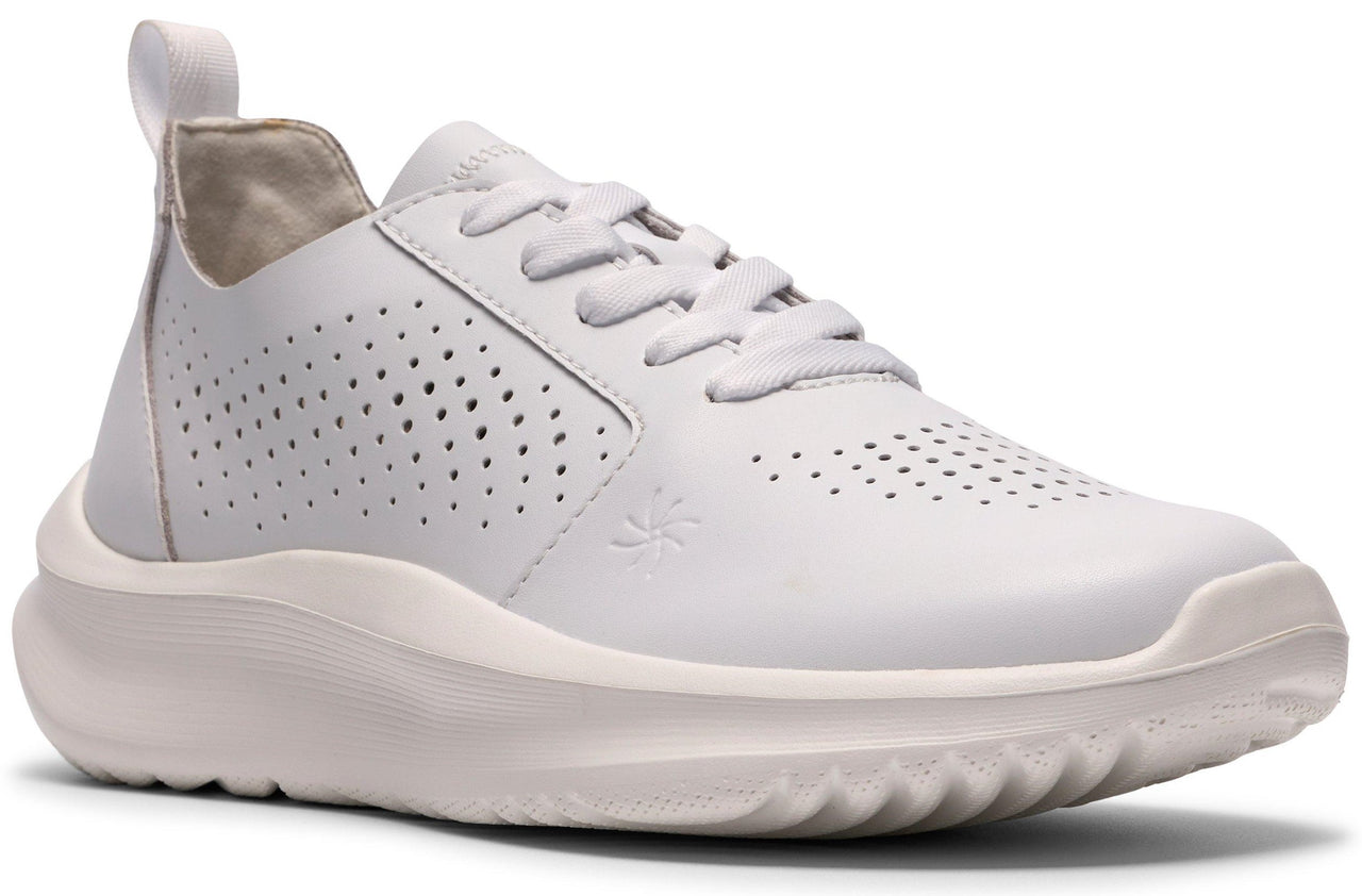 A white leather sneaker with a thick white sole, lace-up closure, and perforated detailing on the sides and toe.