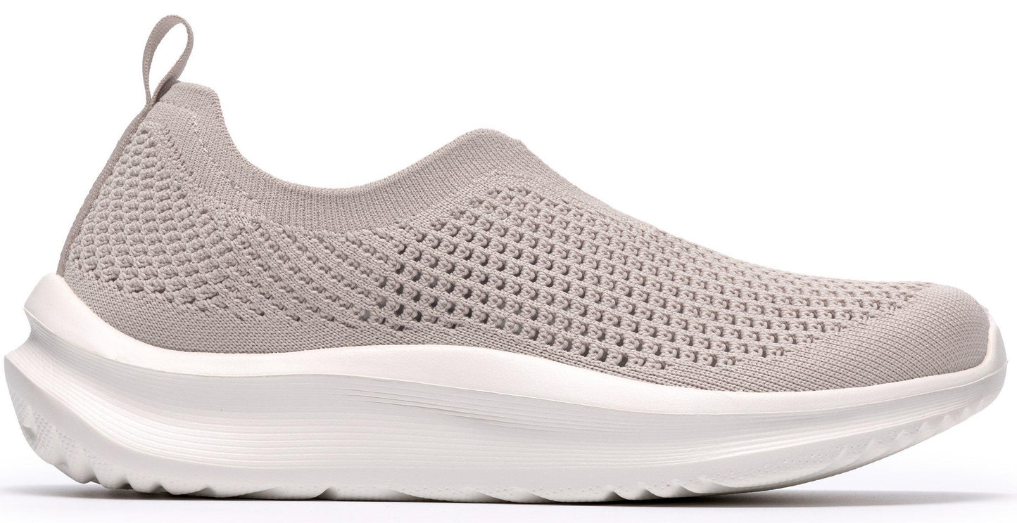 Light tan mesh slip-on sneaker with a thick white sole.