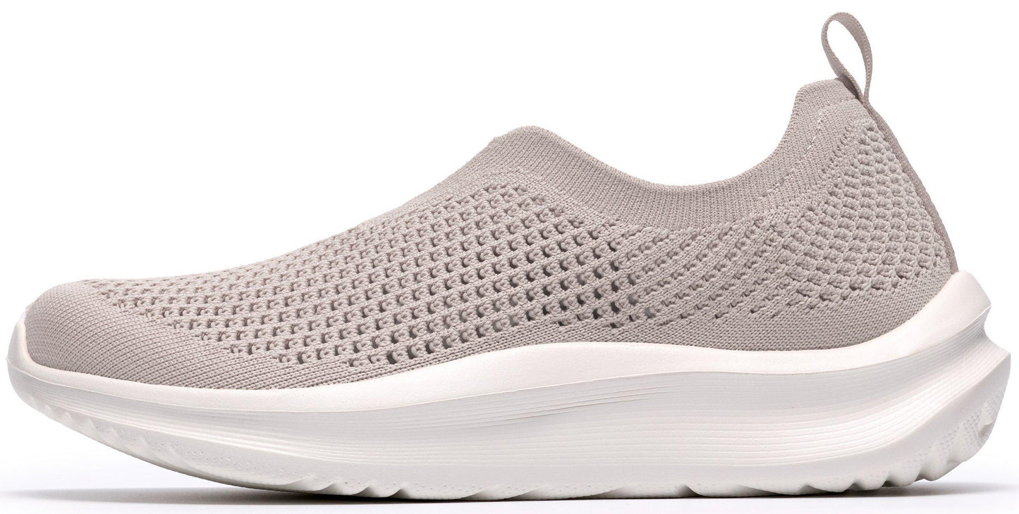 Beige knit slip-on athletic shoe with white sole and back loop.
