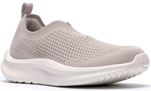 Knit slip-on sneaker in a light beige color, featuring a white sole and a heel tab.