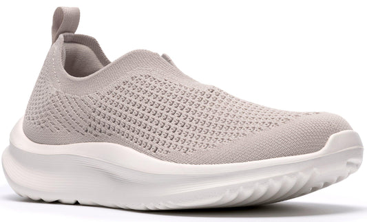 Knit slip-on sneaker in a light beige color, featuring a white sole and a heel tab.