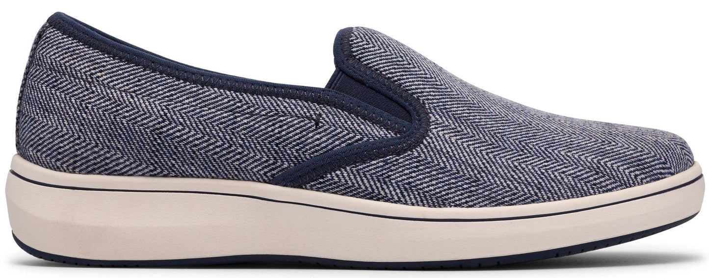 A slip-on sneaker with a herringbone pattern on the upper.