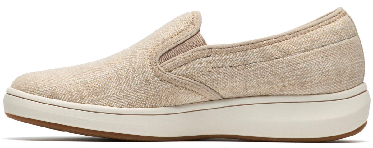 Beige slip-on sneaker with a herringbone pattern.