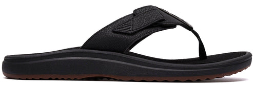 A black sandal with a strap.