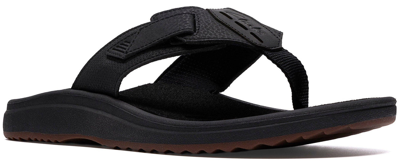 A black flip-flop sandal with a thick sole.