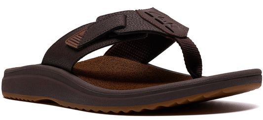 A brown sandal with a thick sole and a toe post.