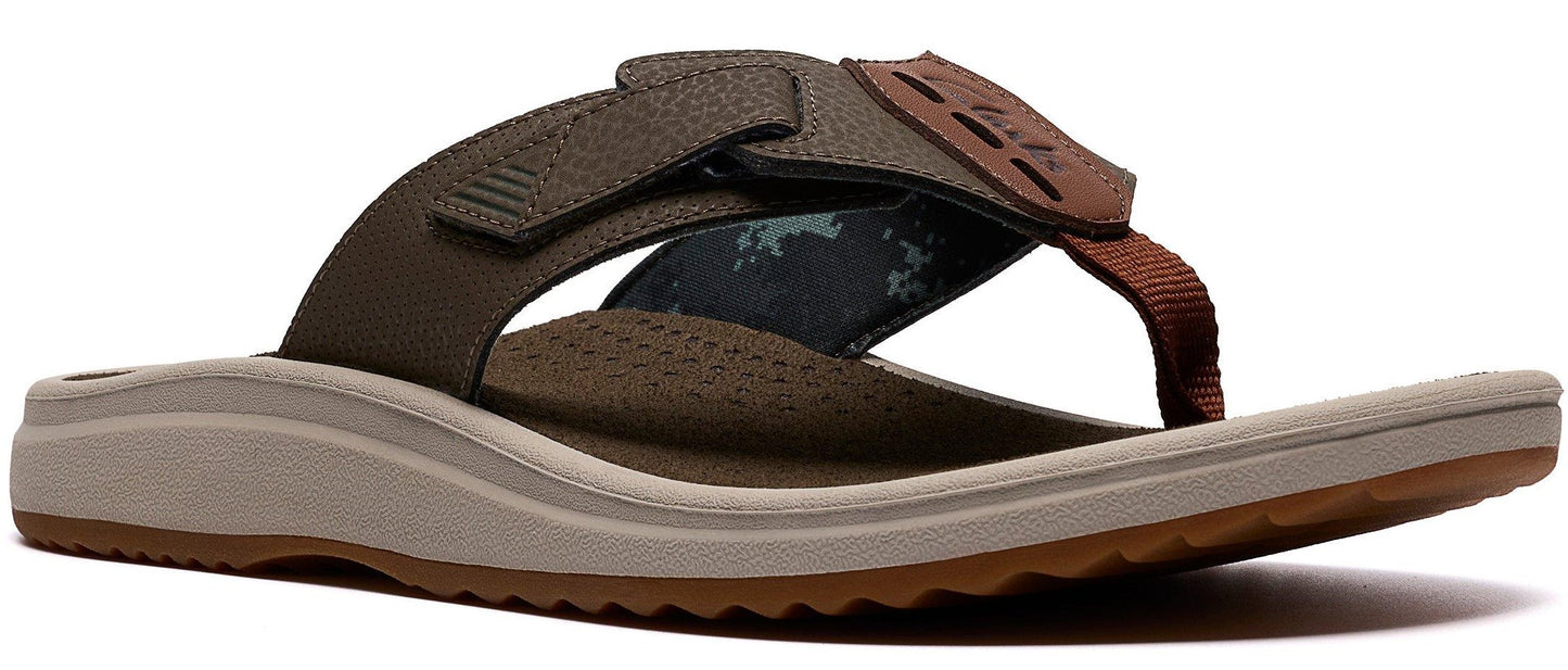 a brown sandal with a velcro strap