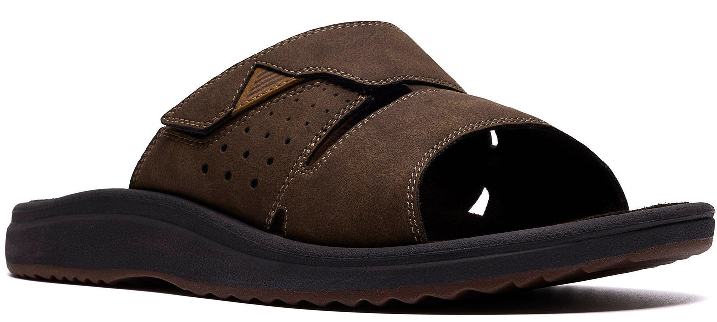 A brown, leather slide sandal with a thick, black sole.