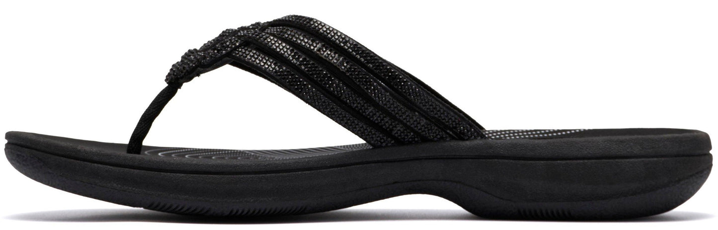 A black flip-flop sandal with woven straps.