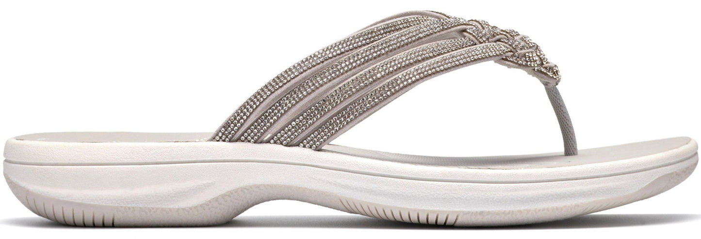 A women's braided thong sandal in a light grey color with a flat sole.