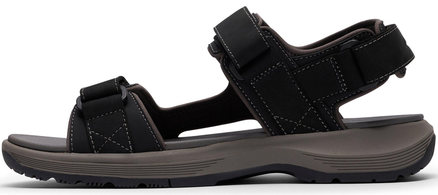 A black sandal with adjustable straps.