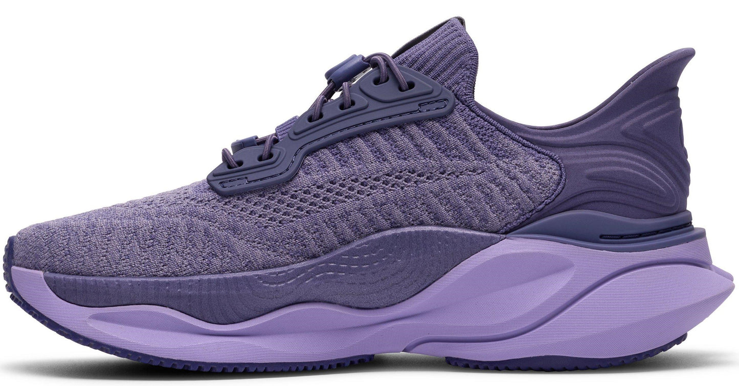Side view of a purple running shoe with a purple sole.