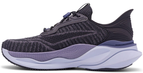 Side view of a dark grey running shoe with a lavender accent and a thick white sole.