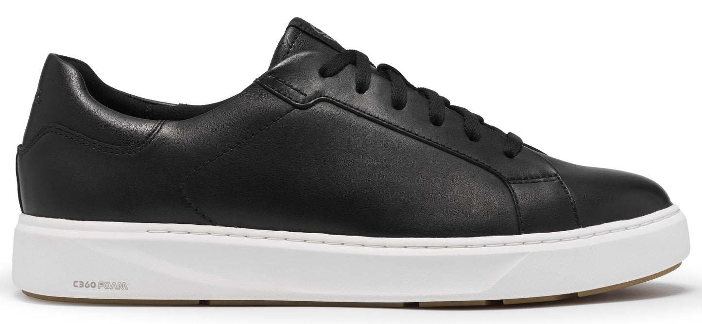 A black leather low-top sneaker with a white cushioned sole, black laces, and the embossed text "C90 FOAM" on the side of the heel.