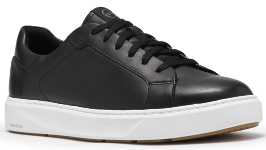 A minimalist black leather low-top sneaker with black laces, a clean white rubber midsole, and a gum-colored outsole.