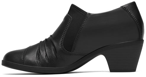 A black leather slip-on ankle boot with a rounded toe, subtle pleating on the side, elastic side gussets, and a low, block heel.